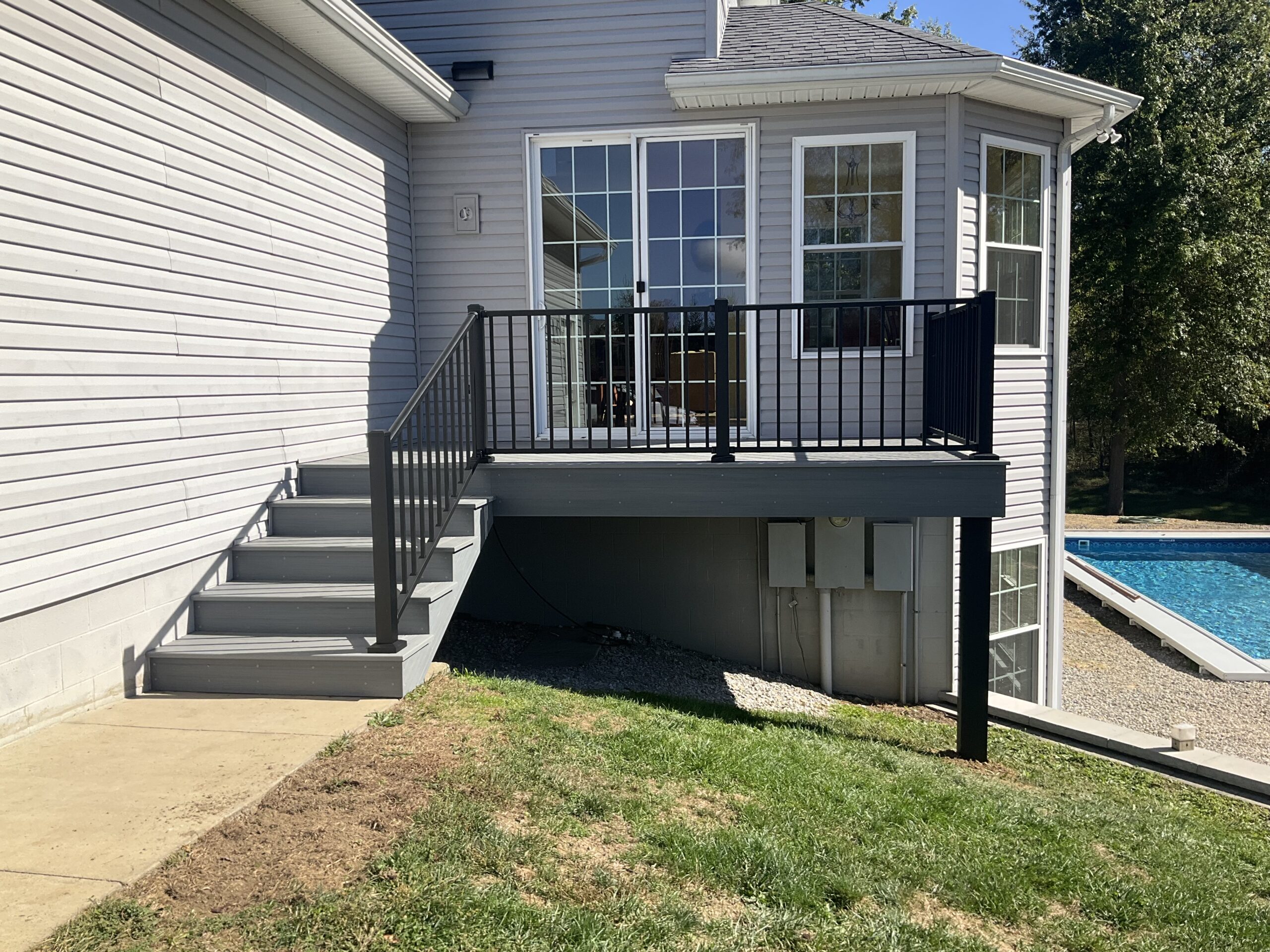 Composite Decking & Aluminum Railing, installed by Swiss Valley Fence. Kidron Ohio.