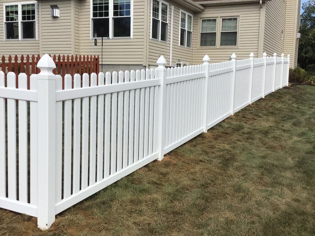 Vinyl Picket Fence, installed by Swiss Valley Fence. Barberton Ohio