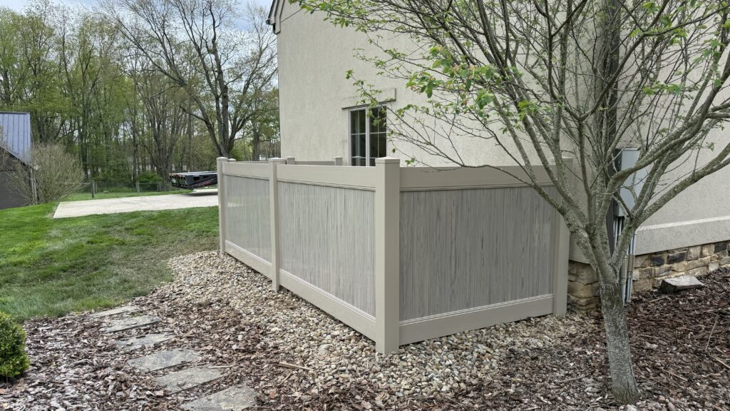 Vinyl Privacy Fence, installed by Swiss Valley Fence. Zoarville Ohio.