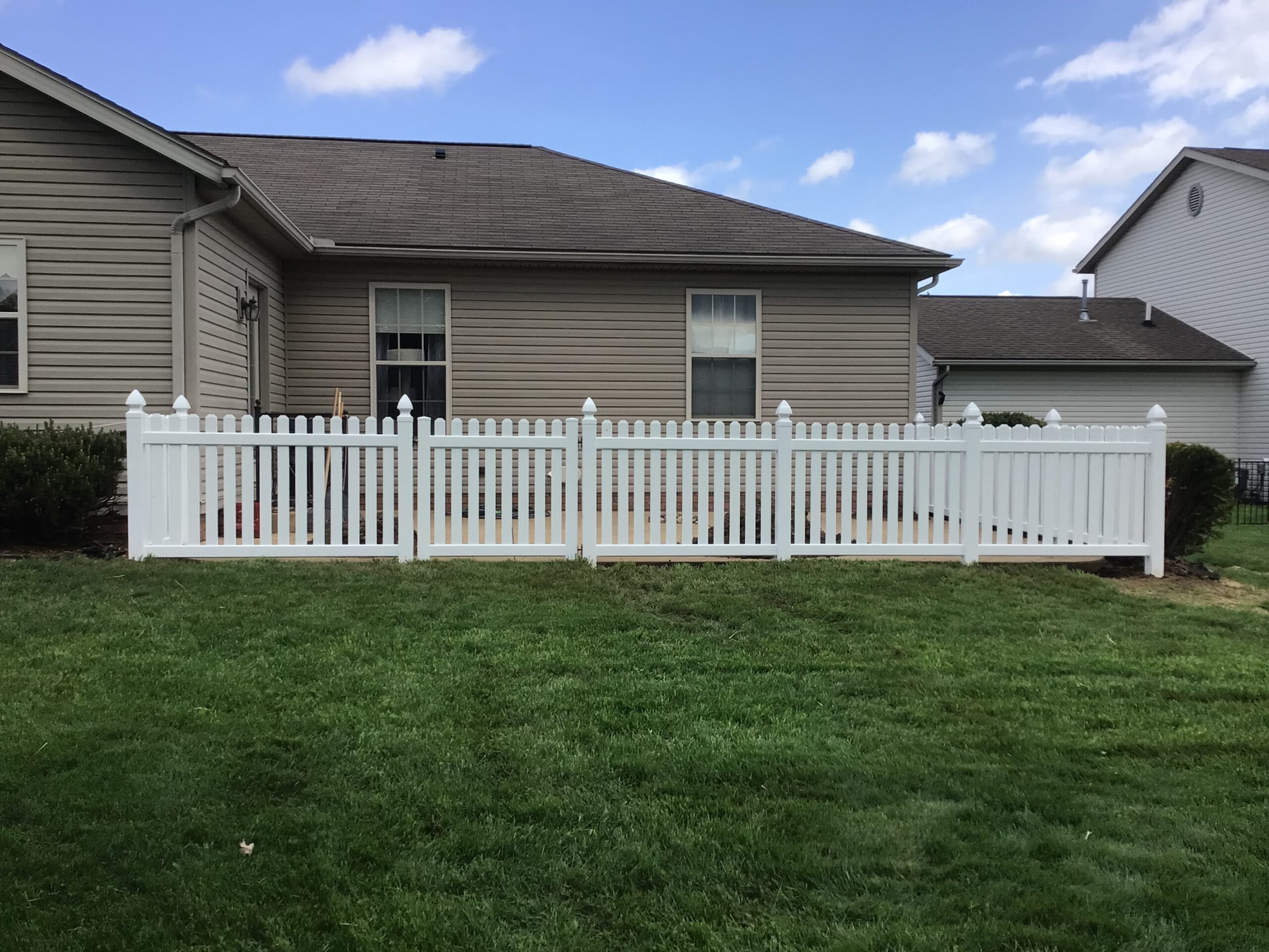 Vinyl Picket Fence, installed by Swiss Valley Fence. Conesville Ohio.