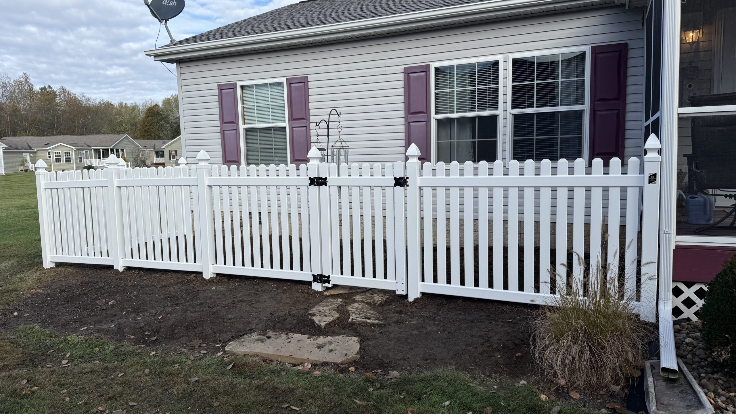 Vinyl Picket fence, installed by Swiss Valley Fence. Burbank Ohio.