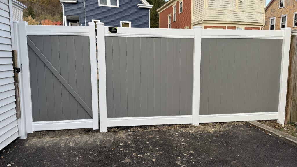 Vinyl Privacy Fence, installed by Swiss Valley Fence. Bridgeport Ohio.
