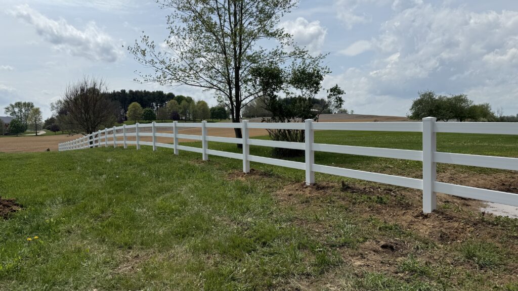 Vinyl Rail Fence, installed by Swiss Valley Fence. Chandlersville Ohio.