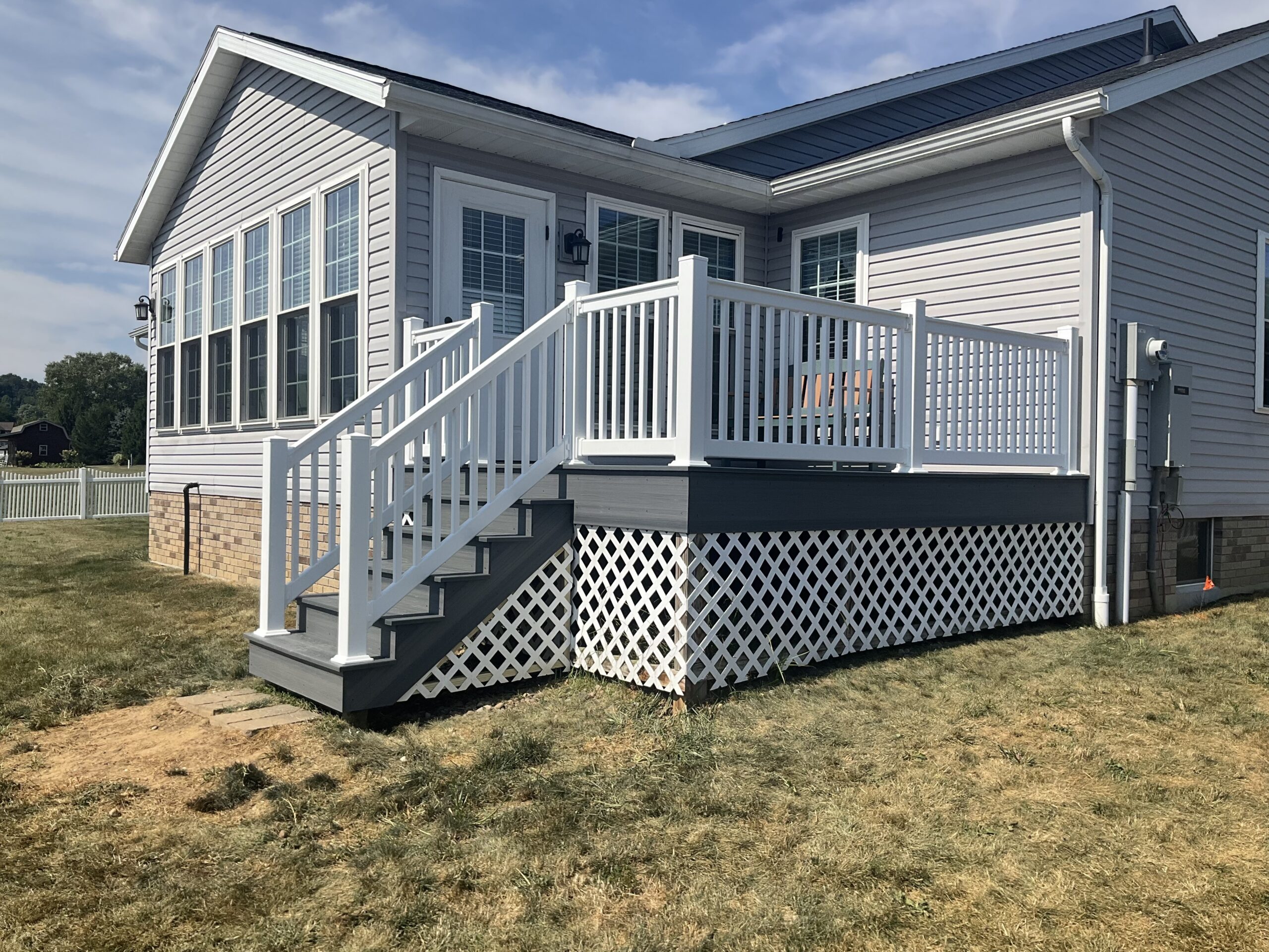 Composite Deck, installed by Swiss Valley Fence. Danville Ohio.