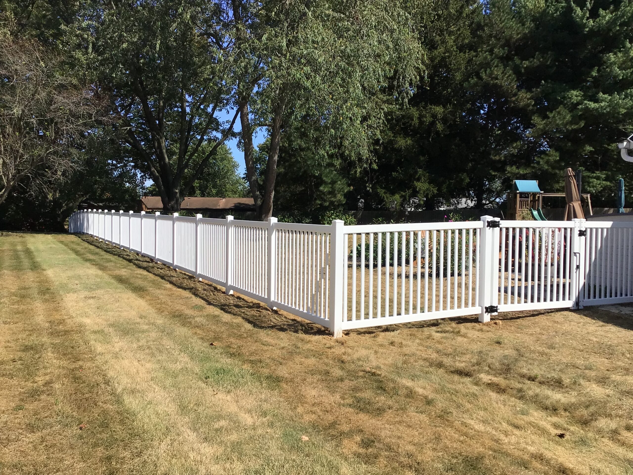 Vinyl Picket Fence, installed by Swiss Valley Fence. Creston Ohio.