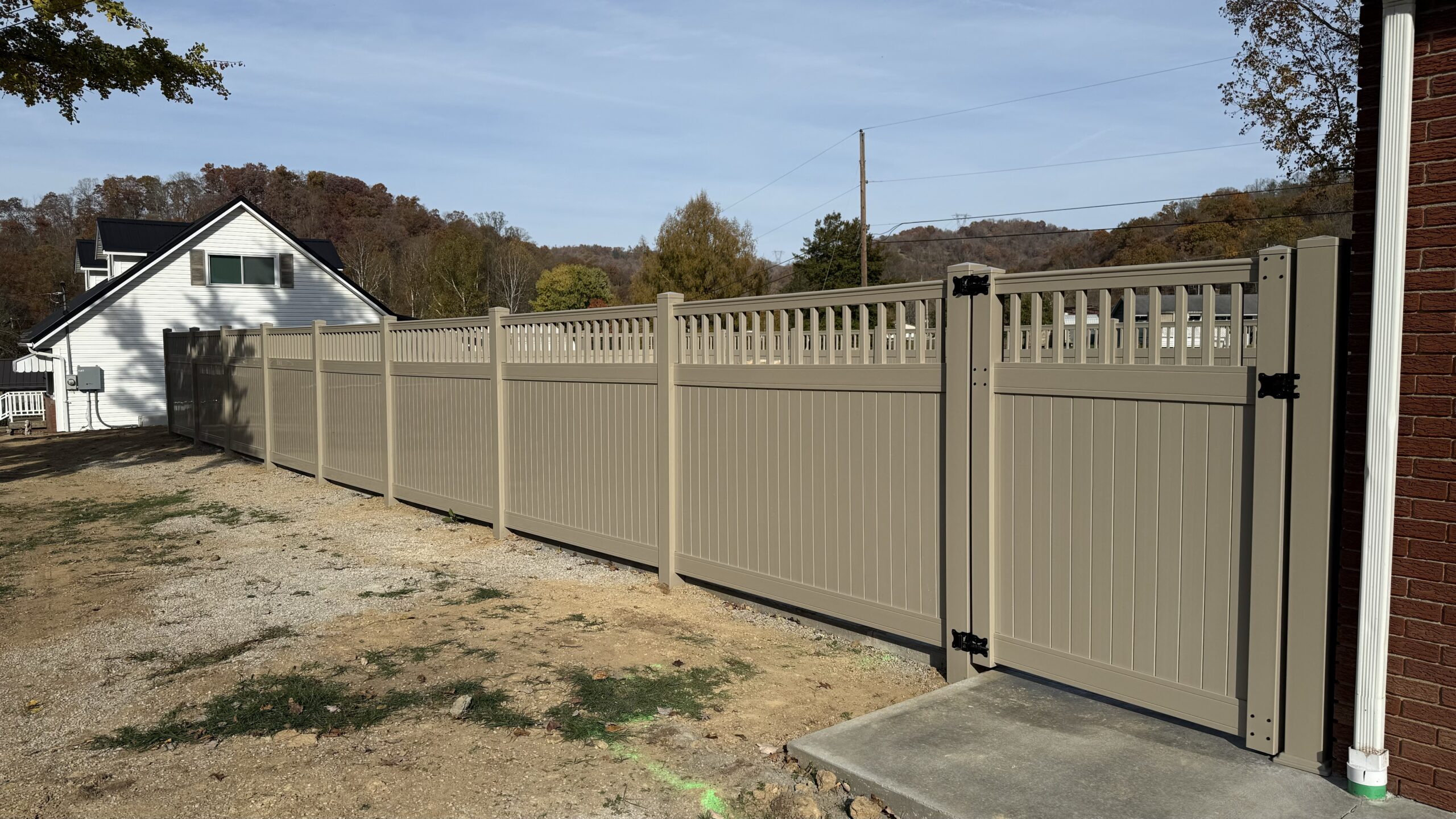 Vinyl Privacy Fence, installed by Swiss Valley Fence. Follansbee West Virginia.
