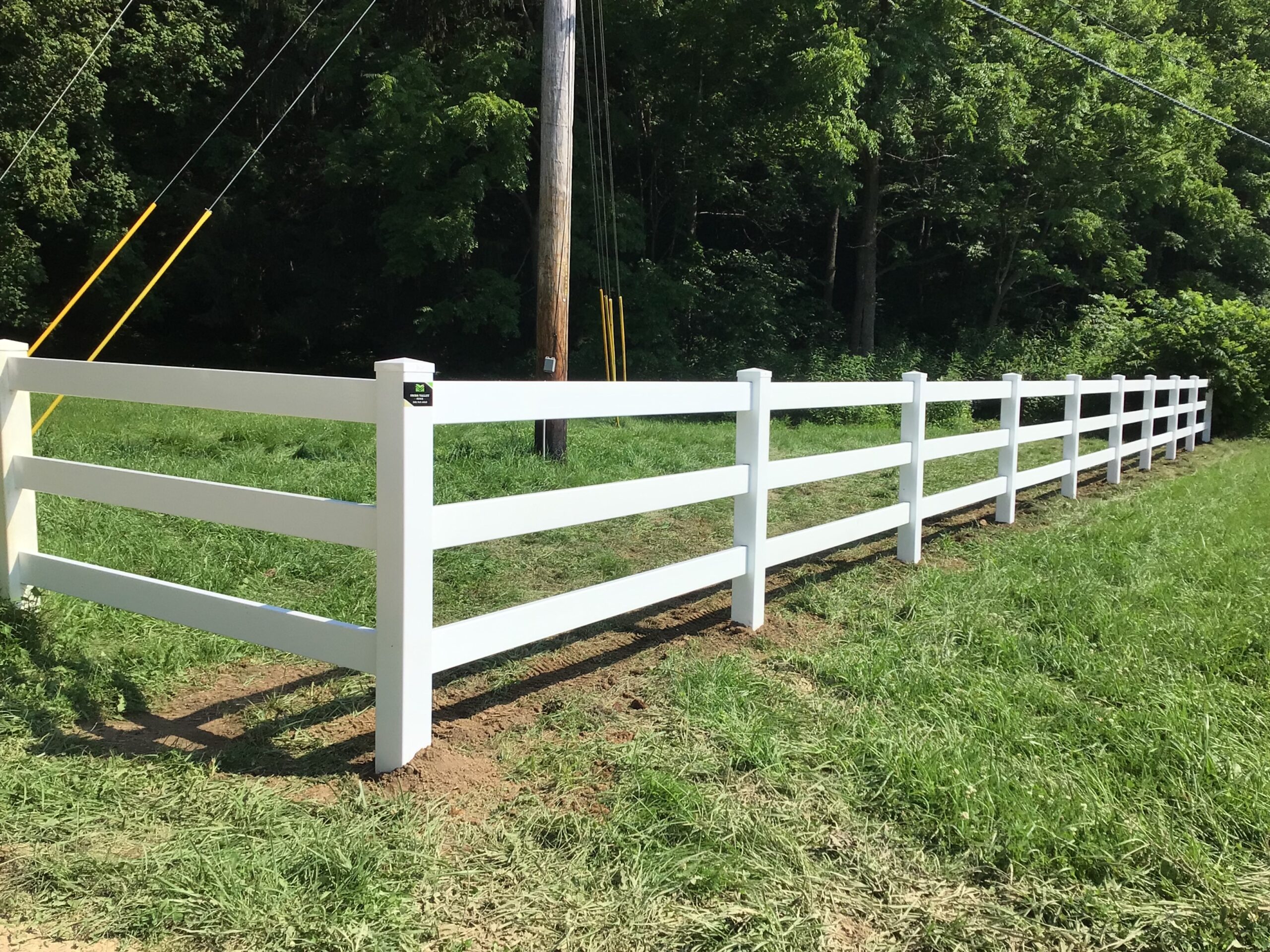 Vinyl Rail Fence, installed by Swiss Valley Fence. Copley Ohio.